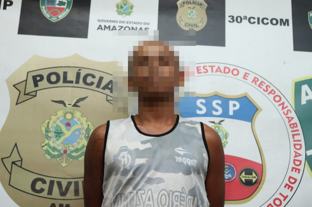 Homem preso por homicídio.