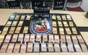 Imagem da notícia - PM prende dois homens e uma mulher com arma, drogas e dinheiro